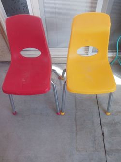 Two toddler chairs, one red one yellow...10.00 each or 15.00 for both.