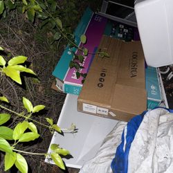 Empty box for Hisense 55-inch TV, empty long, flat Target box, and Smaller Long, Flat Box.