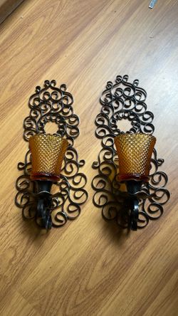 Vintage wall decor hanging black candle holders.  12x6" ex cond as is. Pick up deliver.