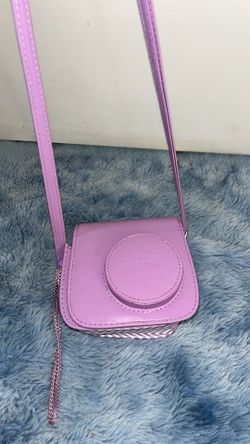 purple Polaroid camera