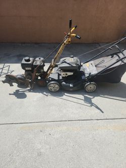 Walk behind front propelled, lawn, mower and edger.
