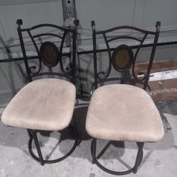 2 Swivel Chairs Used And Good Cond