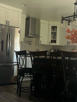 Black Metal Bar Stools with Cushioned Seats