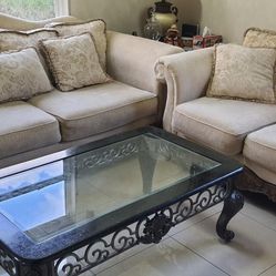 Beautiful sofa, loveseat, coffee table and end table.