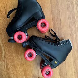 2 Pairs of Sure Grip Roller Skates