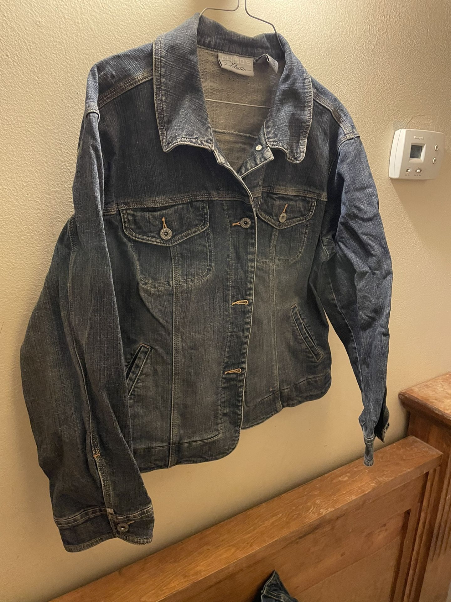 Jean jacket. Made by Old Navy. Size small. New. Six dollars.