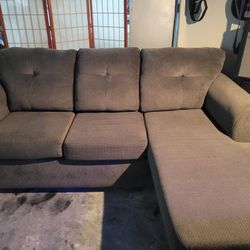 Sectional Piece With Attached Chaise Lounge 