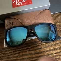 RAY BAN JUSTIN’S - BLACK FRANE w/  POLARIZED ICE BLUE MIRROR LENSES. 55mm. BRAND NEW IN BOX. 