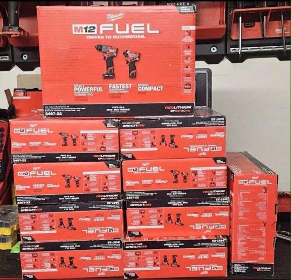 Milwaukee New kit hammer drill and Impact Fuel 12M ,batteries and charger $200 each one