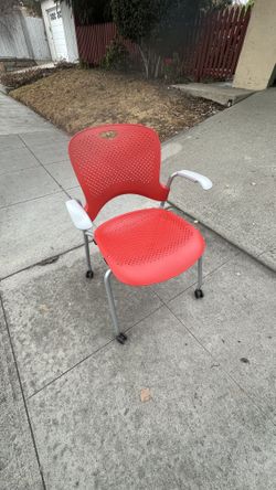 Herman miller caper red chair with wheels