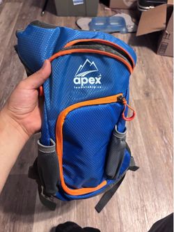 Apex Leadership Co. blue and orange hiking hydration backpack