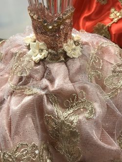 Dressed Toasting glasses champagne bottle dresses and center pieces!! They are super cute and made to ur order. Price ranging from $25-$50 depending  