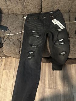 Purple jeans size 34  read description