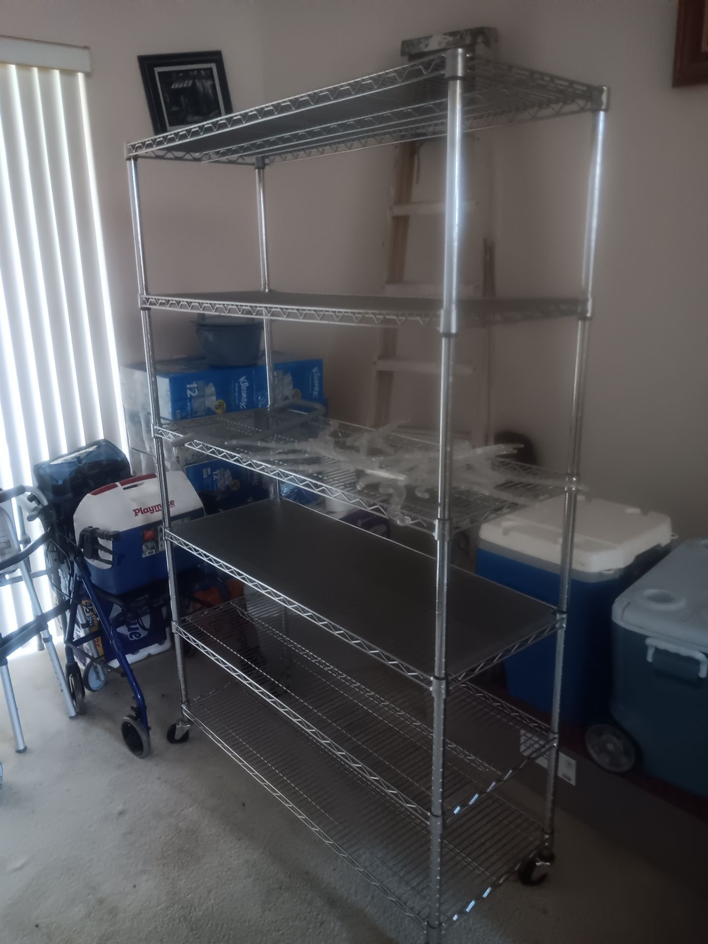 Selling 6 level metal mesh shelf. 6ft 3in high, 4ft wide and 1ft 6in depth. In like new condition. Selling for $40