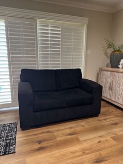 Living Spaces sofa/couch -  “Rincon Black 61" Loveseat”