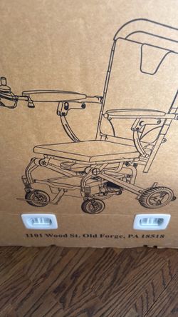 Foldable Rascal electric power wheelchair