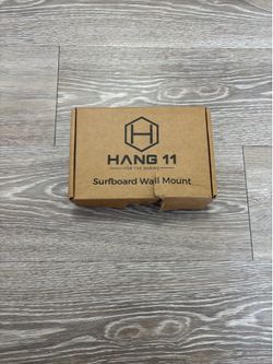 Surf board wall mount