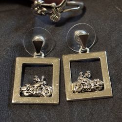 Silver Earrings And Ring.