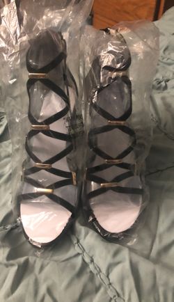 Brand new never worn women heels size 8
