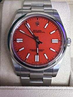 ROLEX OYSTER PERPETUAL CORAL RED DIAL 124300