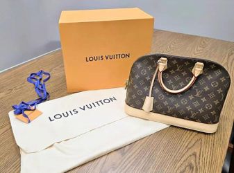 Authentic Alma MM Louise Vuitton handbag