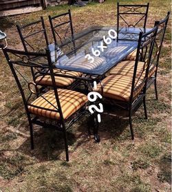 IRON AND GLASS DINING TABLE AND 6 CHAIRS