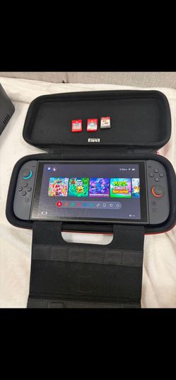 Switch 2 with games and a case