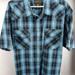 Vintage Cowboy Mens XL Plaid Pearl Snap Button Shirt. Great condition Awesome color combination and design. No fade polyester blend with pearl snap bu