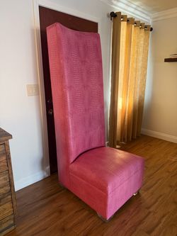 High back pink snake skin chair