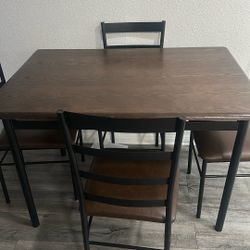 Table And 4 Chairs 
