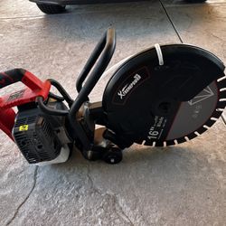 Clean XtremePower US cutter saw. Has 16 inch blade, 52CC engine. Great for cutting concrete, asphalt, masonry. Red and black color.wet dry cutter. Pic