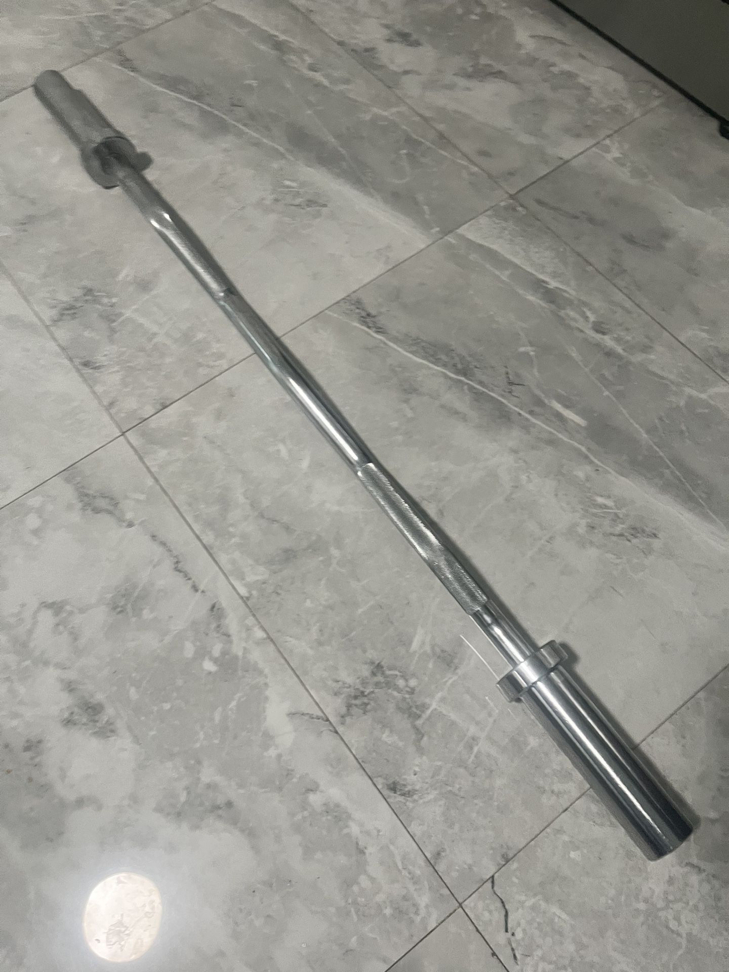 Brand new in wrapper ez curl barbell bar for Olympic weights plates for 2 inch slot of weights also have Olympic 45s new in box for additional price