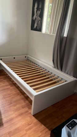 White twin sized bed frame