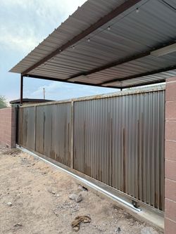 Corrugated steel rolling gate