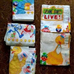 Sesame Street Bedding Comforter Set Complete - Twin size fitted sheet, top sheet, 2 pillow cases and 2 comforters. Also included are a valance and a
