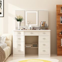 LED Makeup Vanit y Tabl e with Touch Control Mirror, 3 Color Lighting Modes, Jewelry Storage Drawe rs & Power Outlet - White