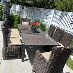 Glass table and 8 rattan chairs