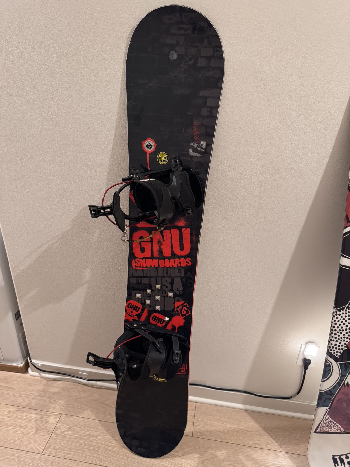 Gnu Carbon Credit Snowboard 162CM with Flow step on and studs stomp pads 