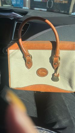 I’m white leather, brown purse