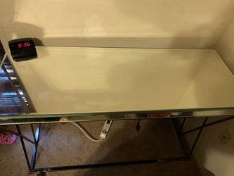 Glass table with metal standing