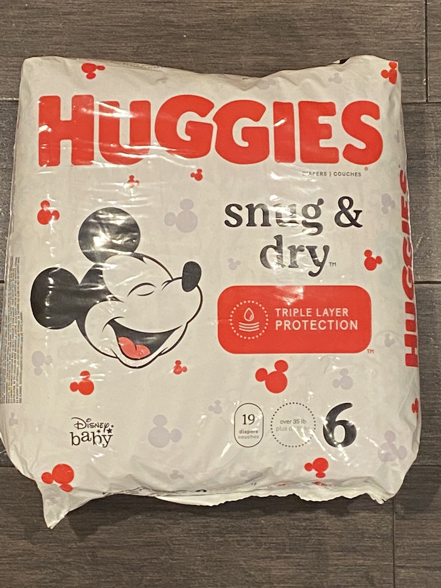 HUGGIES SNUG & DRY SIZE 6 DIAPERS 19 COUNT DISNEY BABY