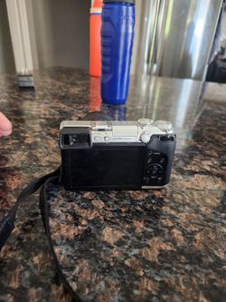 Panasonic Lumix Mirrorless Camera with Lens