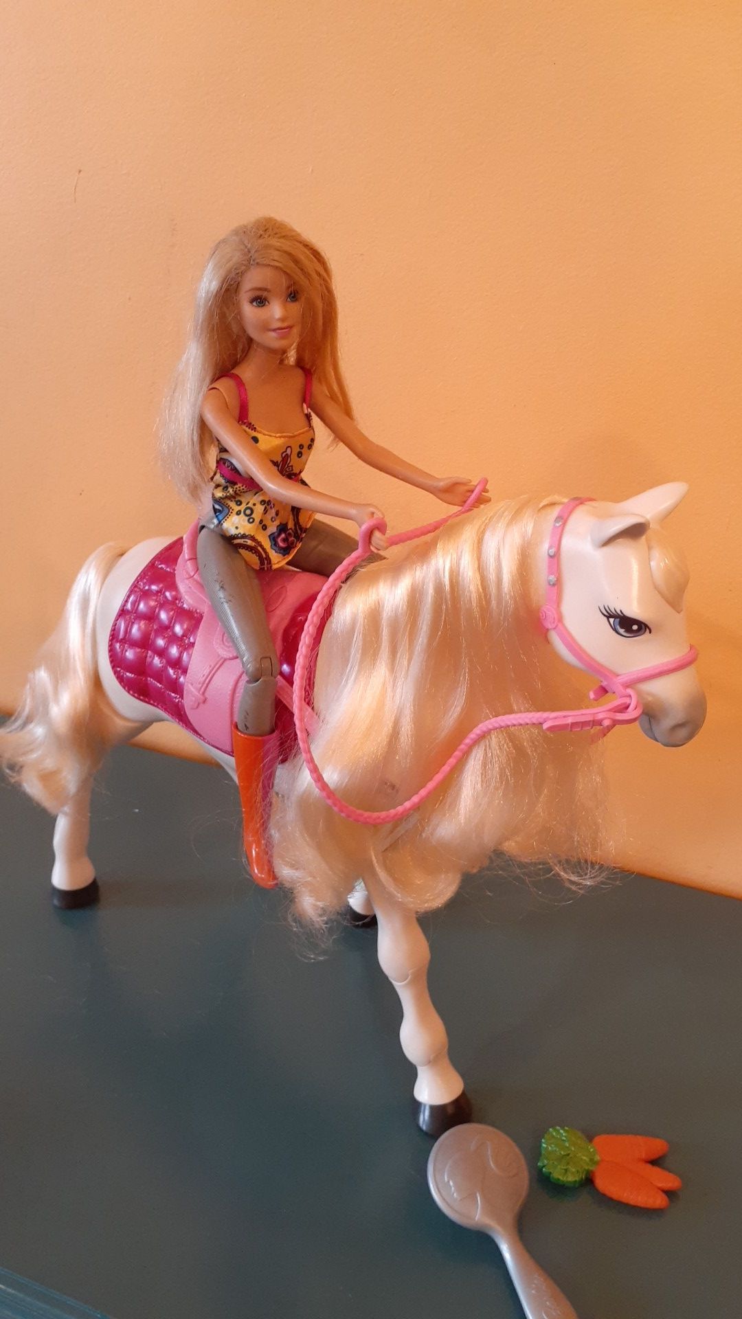Barbie and walking tawny horse