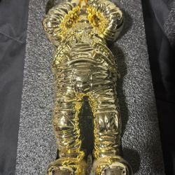 Kaws Holiday Space Figure Gold