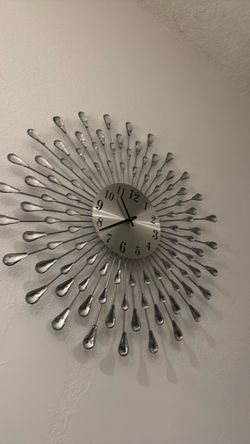 Silver Sunburst Wall Clock with Crystal Accents