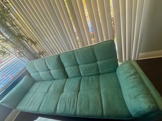 Teal blue futon