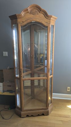 Oak corner curio cabinet... Beautiful