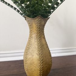 Nice artificial plant in yellow vase