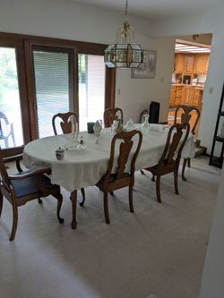 Dining room table with six matching chairs