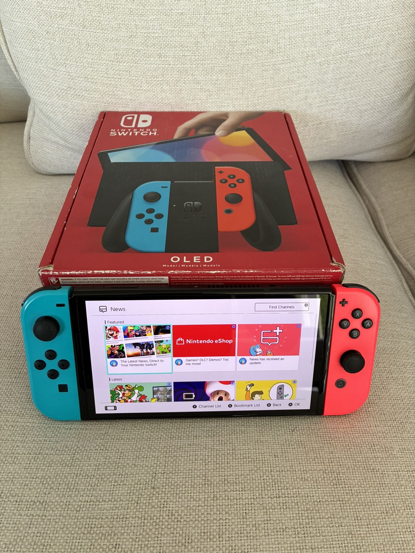 Nintendo Switch OLED System / Console - With Everything Included - Blue / Red Version . System has scratches on screen but works great. I also have a